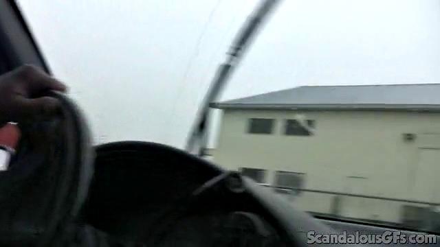 A amateur GF tease her pussy in the car while wearing glasses