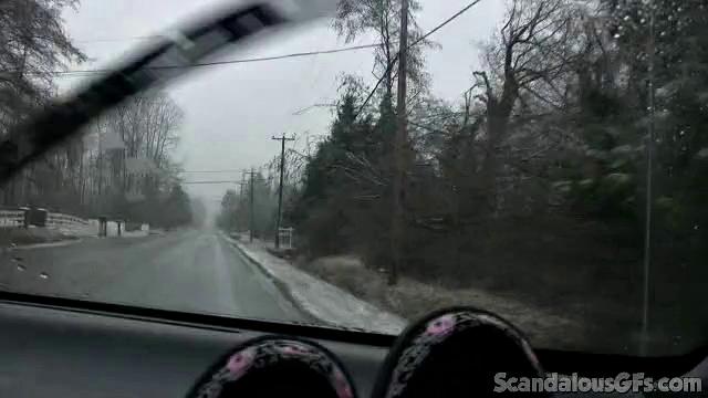 A amateur GF tease her pussy in the car while wearing glasses