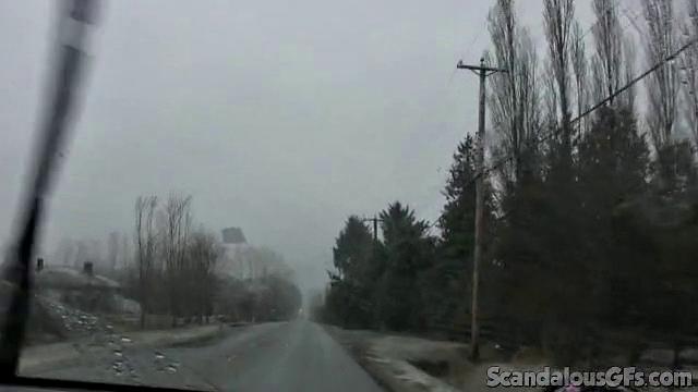 A amateur GF tease her pussy in the car while wearing glasses