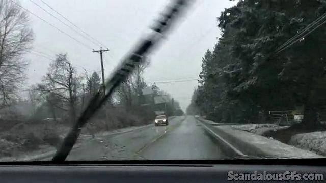 A amateur GF tease her pussy in the car while wearing glasses