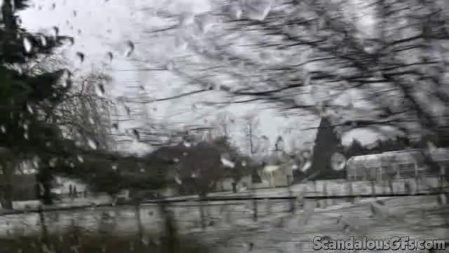 A amateur GF tease her pussy in the car while wearing glasses