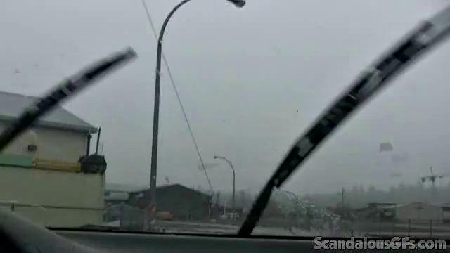 A amateur GF tease her pussy in the car while wearing glasses