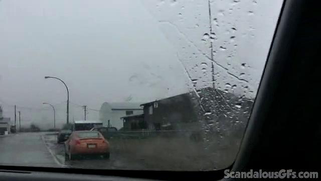 A amateur GF tease her pussy in the car while wearing glasses