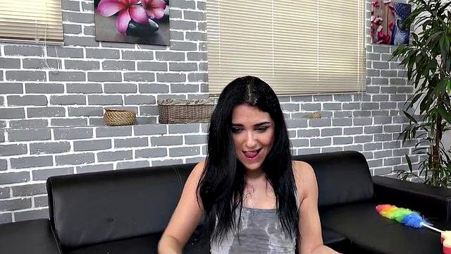 Kinky brunette gets drenched in pee while playing with her nipples in the living room