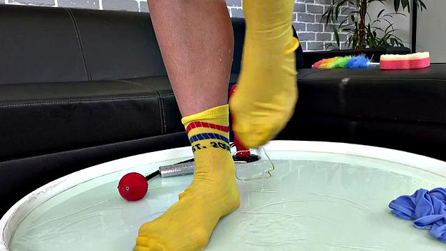 Kinky brunette gets drenched in pee while playing with her nipples in the living room