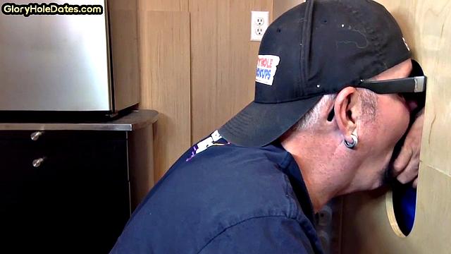 Gloryhole gay enjoys jerking while sucking big dick