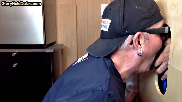 Gloryhole gay enjoys jerking while sucking big dick