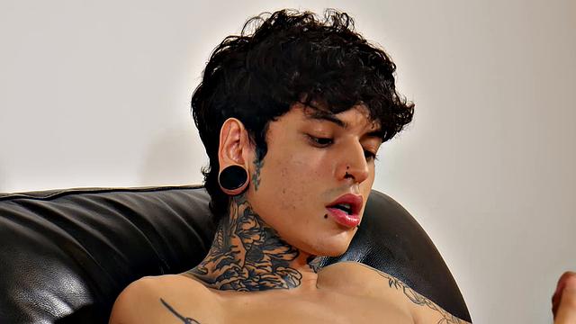 Ethan Cruz takes a hard cock and moans with pleasure