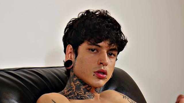 Ethan Cruz takes a hard cock and moans with pleasure