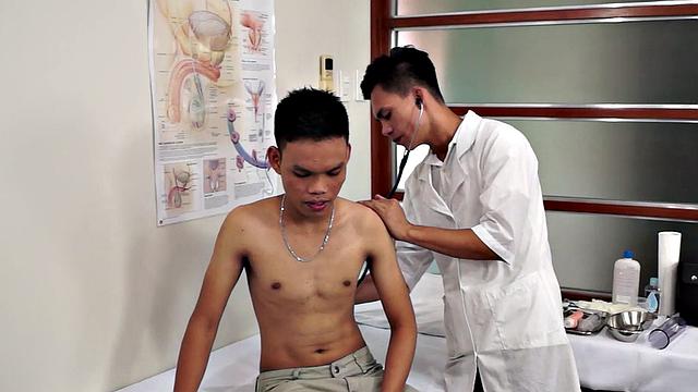 Assfingered Asian twink toyed by doctor after medical check