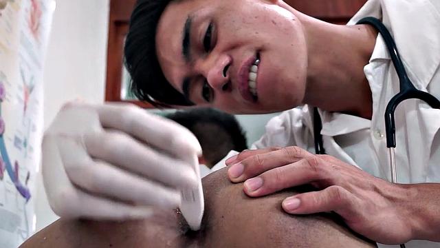 Assfingered Asian twink toyed by doctor after medical check