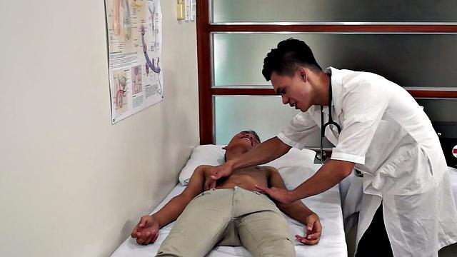 Assfingered Asian twink toyed by doctor after medical check