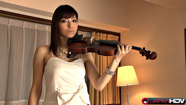 Sexy Yuria Tominaga is very beautiful in her white dress. The babe plays violin very well but do you thing that she can slide her bow in a other place ?