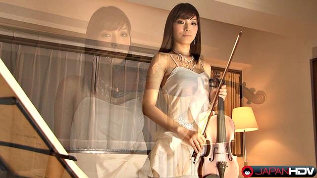 Sexy Yuria Tominaga is very beautiful in her white dress. The babe plays violin very well but do you thing that she can slide her bow in a other place ?