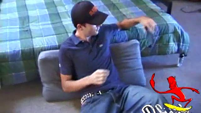 Dan gets down on the floor and turns on a video. He goes right for his cock and plays with himself until he's rock hard. Rolling the head with his palm Dan lubes up his cock.