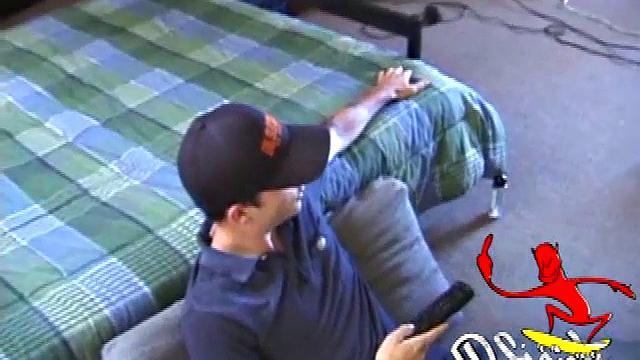 Dan gets down on the floor and turns on a video. He goes right for his cock and plays with himself until he's rock hard. Rolling the head with his palm Dan lubes up his cock.