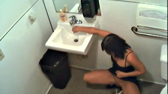 Kinky amateur pissing in restroom