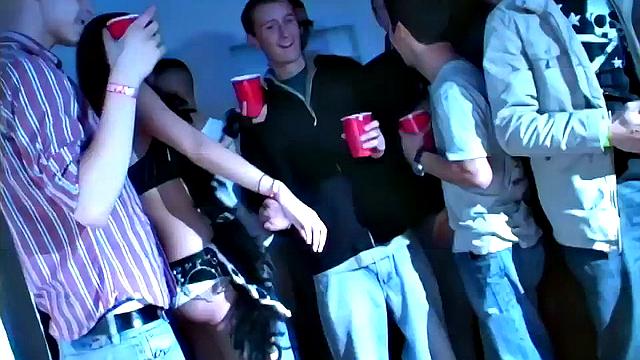 Eating party whore goes down on big cock at party