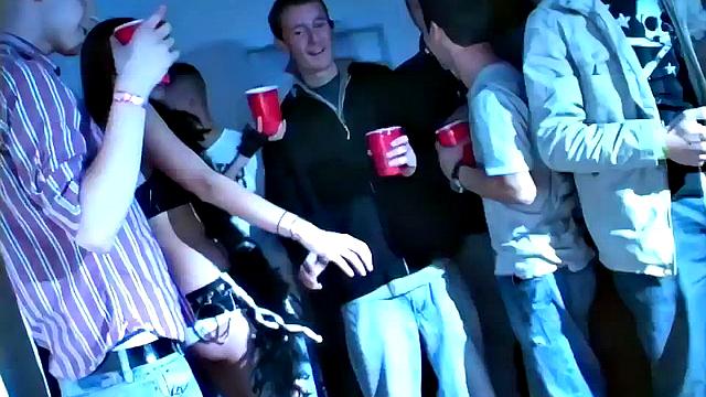 Eating party whore goes down on big cock at party