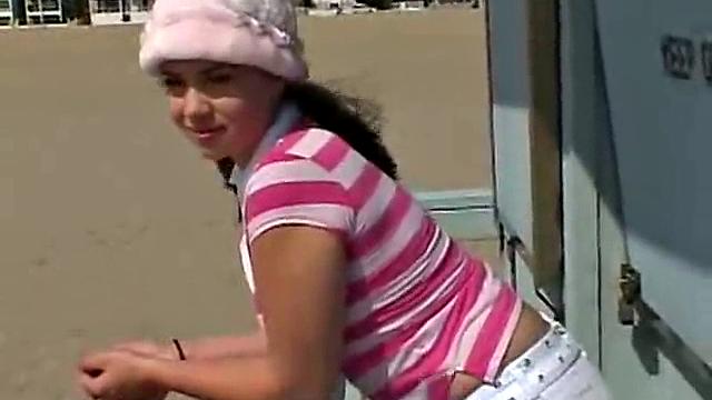 Sweet Teen April's Beach Walk And Holiday