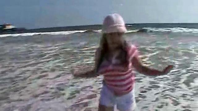 Sweet Teen April's Beach Walk And Holiday