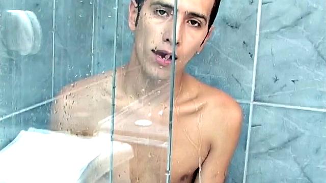 Stripped to his t-shirt and underwear, Latin twink Alfonso hops in the shower and turns on the water. It's easy to see that big stiff cock of his, through the wet underwear, before stripping naked and jerking off on the shower floor.
