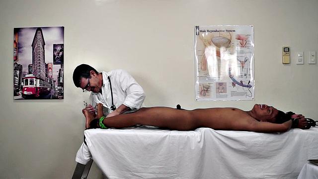 Kinky Doctor Tickles is delighted to have a cute new Asian boy for his tickling fetish treatment. But Russel isn't that ticklish, sadly.