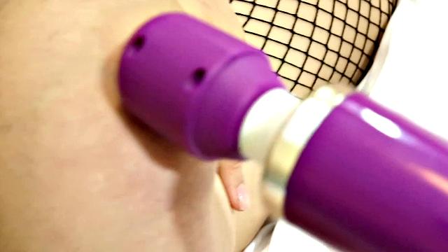 Huge Natural Boobs In Fishnet And Pink High Heels And Magic Wand