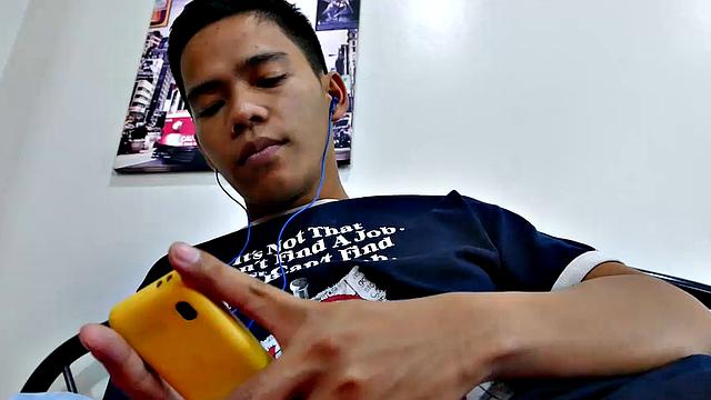 Gay Asian twink Marcon tries to not jerk off so much by listening to some tunes. But his obsession with male feet keeps him thinking about feet most of the time. Marcon gives in and starts feeling horny, needing to have a wank.