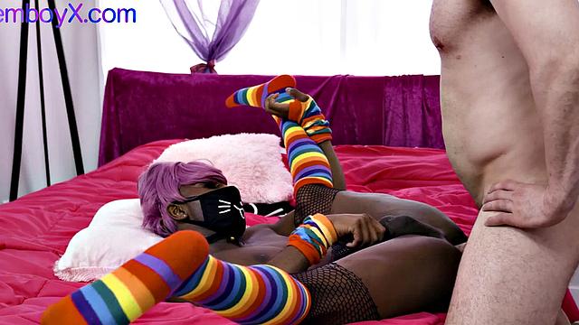 Black masked femboy in fishnets fucked in butthole