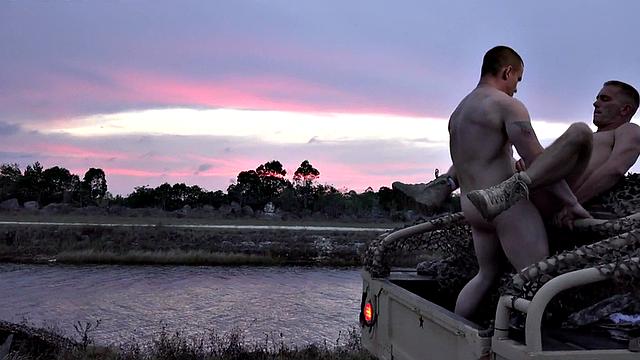 Military jock fucked outdoors on army van by colleague