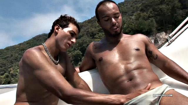 Alan and Matheus are out boating when they pulk into a secluded island cove. With no one in sight, the Latinos decide to fuck under the hot South American sun. Once the two are naked, Alan goes down on Matheus who quickly gets hard.
