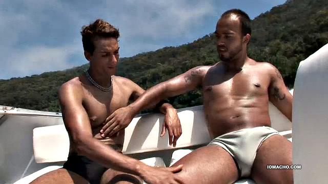 Alan and Matheus are out boating when they pulk into a secluded island cove. With no one in sight, the Latinos decide to fuck under the hot South American sun. Once the two are naked, Alan goes down on Matheus who quickly gets hard.