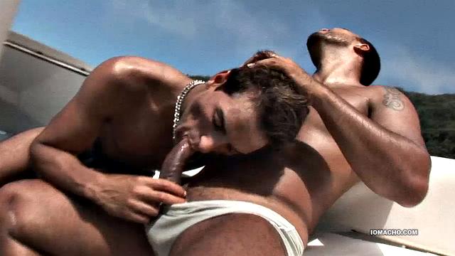 Alan and Matheus are out boating when they pulk into a secluded island cove. With no one in sight, the Latinos decide to fuck under the hot South American sun. Once the two are naked, Alan goes down on Matheus who quickly gets hard.