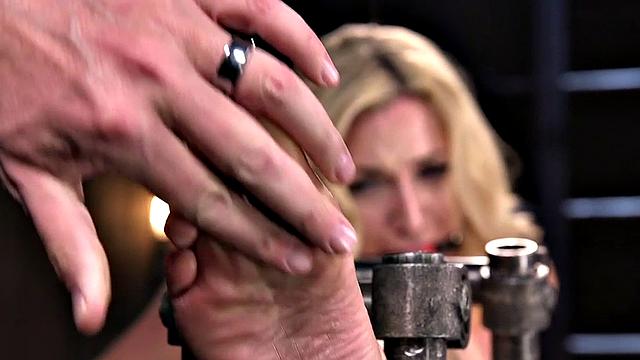 BDSM sub endures feet whipping and pussytoying by master