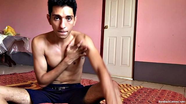 On a bed, Santiago slowly strips to his underwear, as he works on getting his uncut cock hard. Then he pulls that boner out the leg of his briefs and plays with it. On his back, the slim and smooth boy starts jacking off.