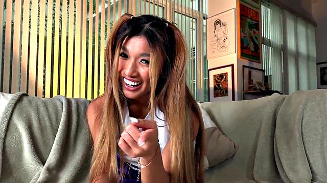 Petite Asian cheerleader plays POV dick with magic hands