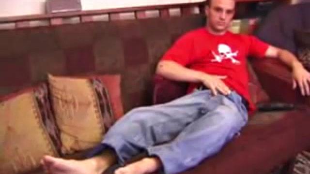 Ethan strips naked and strokes up a boner, while watching porn. After lubing up his ass, he fingers himself and then inserts a dildo. Ethan gives his hole a good workout and shoots a huge nut onto his chest.