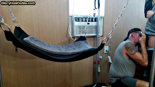 Mature daddy with tattoos and moustache fucked in sling