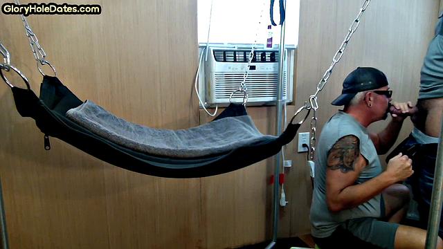 Mature daddy with tattoos and moustache fucked in sling