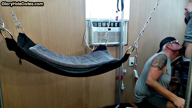 Mature daddy with tattoos and moustache fucked in sling