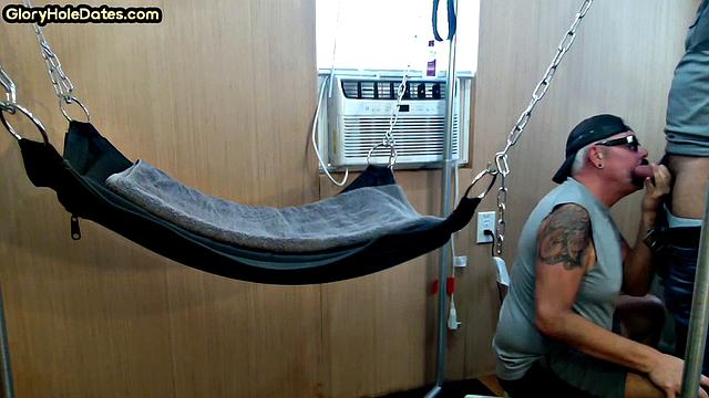 Mature daddy with tattoos and moustache fucked in sling