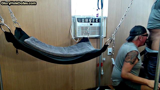 Mature daddy with tattoos and moustache fucked in sling