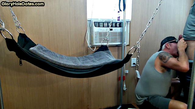 Mature daddy with tattoos and moustache fucked in sling