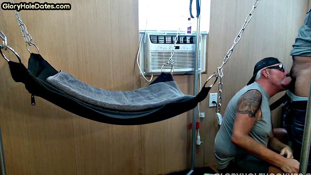 Mature daddy with tattoos and moustache fucked in sling