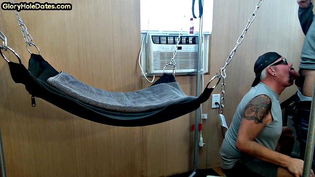 Mature daddy with tattoos and moustache fucked in sling