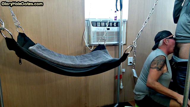 Mature daddy with tattoos and moustache fucked in sling