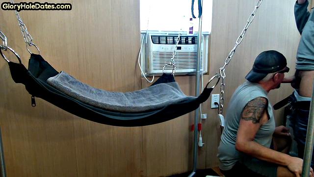 Mature daddy with tattoos and moustache fucked in sling