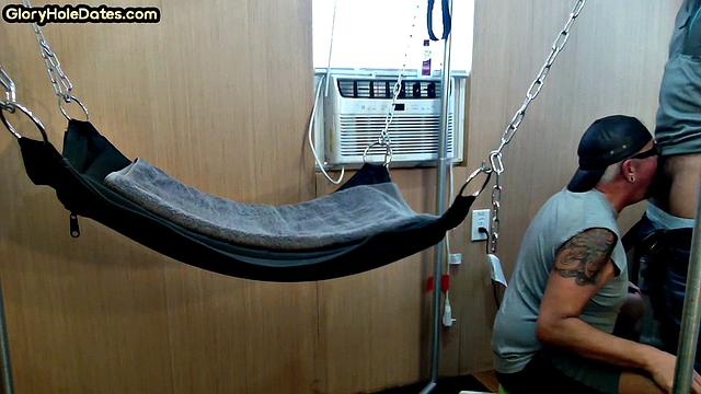 Mature daddy with tattoos and moustache fucked in sling