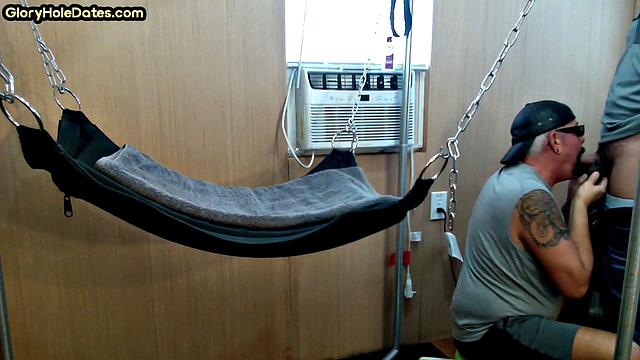 Mature daddy with tattoos and moustache fucked in sling